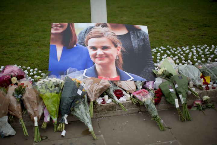 Floral tributes for Jo Cox placed on Parliament Square outside the House of Parliament