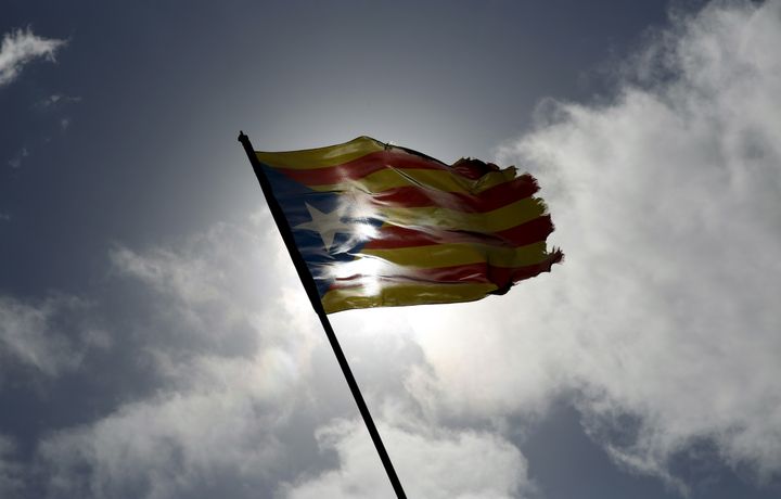 An "estelada" (Catalan separatist flag) hangs from a pole in Cabrera de Mar, north of Barcelona, Spain