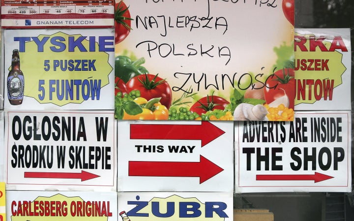 Polish advertisements in a shop window in a Polish area of London. The United Kingdom has seen a surge of immigrants from Pol