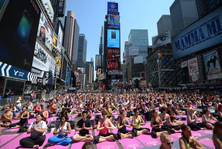A mass yoga class in Times Square. 