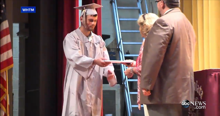 Scott Dunn receiving his diploma. 