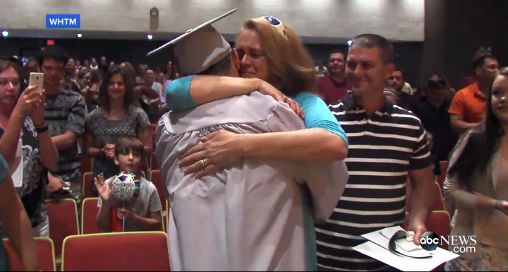 Karen hugs her son, Scott Dunn. 