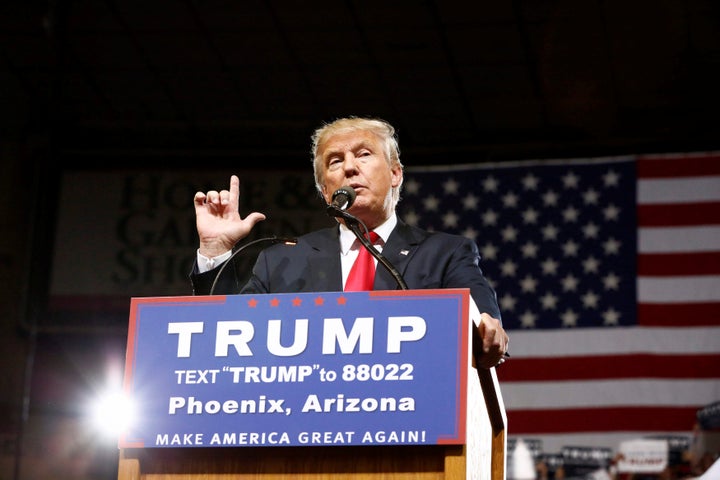 Trump speaks at a campaign rally in Phoenix, Arizona 