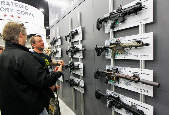 <strong>NRA gun enthusiasts view Sig Sauer rifles</strong>