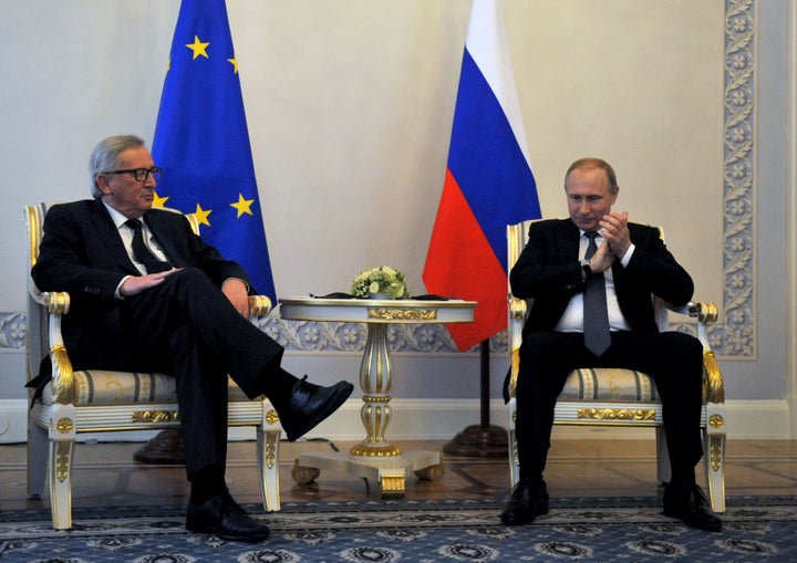 European Commission President Jean-Claude Juncker, left, met Russian President Vladimir Putin at St. Petersburg International Economic Forum on Jun. 16. He's the first EU institution leader to visit Russia since 2014.