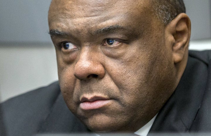 Jean-Pierre Bemba, pictured here waiting for his verdict at the International Criminal Court in March, was sentenced to 18 years in jail on Tuesday.