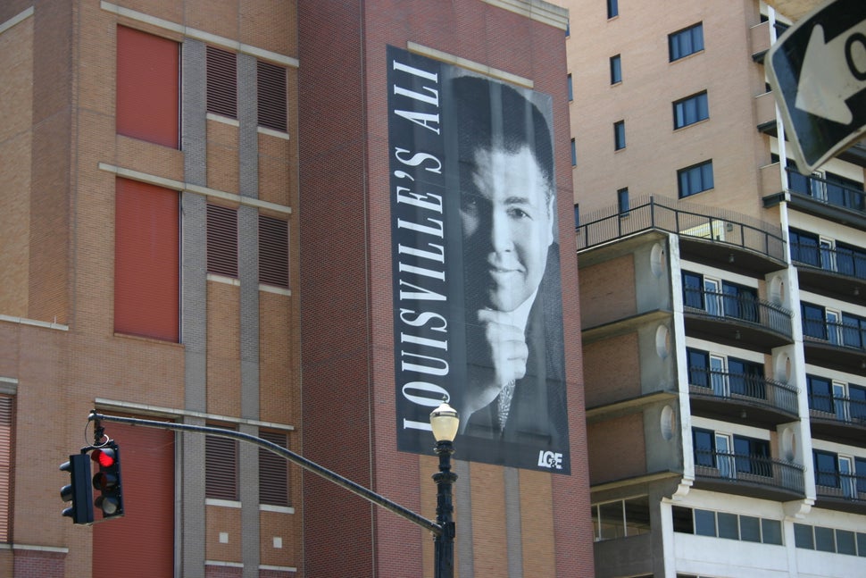 A local organization hung this banner honoring Ali downtown in 2002. It is visible to travelers on multiple highways that int
