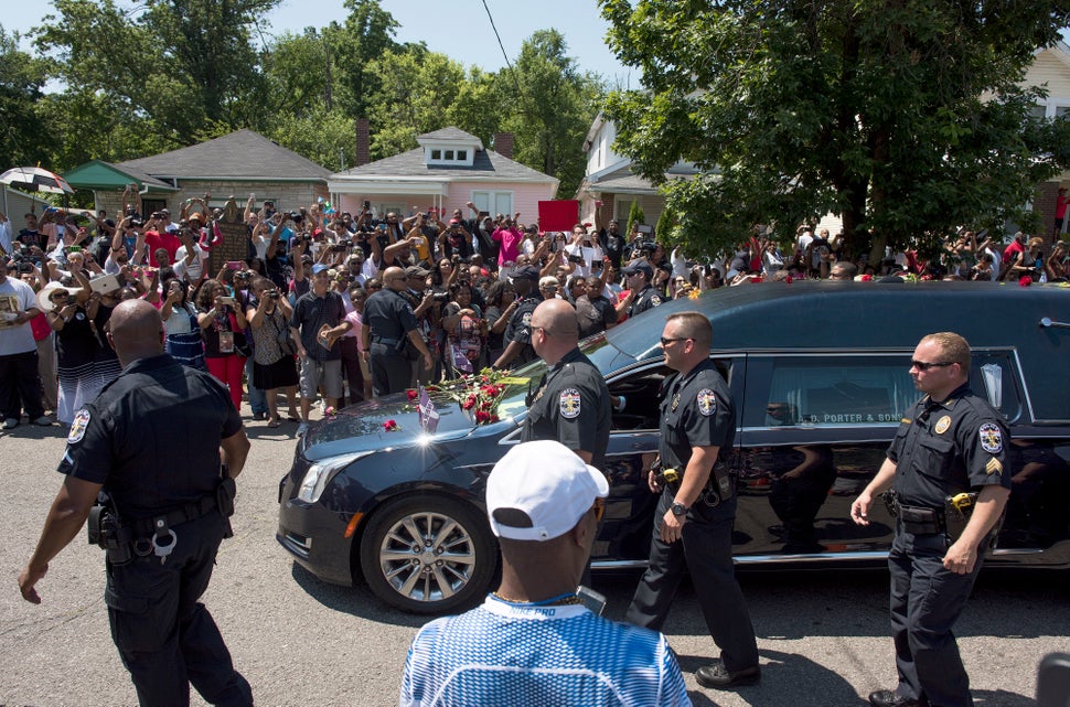 A crowd of more than 1,500 lined Grand Avenue on June 10 in front of the small pink house where Ali lived as a boy as his hea