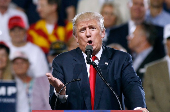 Republican presidential candidate Donald Trump speaks to a crowd of supporters during a campaign rally on June 18, 2016 in Phoenix.