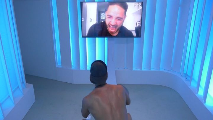 Scott takes a video call from his brother Adam