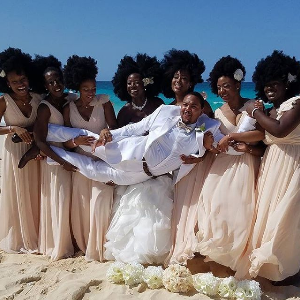 "I have had people share with me how they are or were afraid to wear their natural hair out and I’ve given them some sort of boost to want to wear their God-given tresses," the bride wrote on Instagram. 