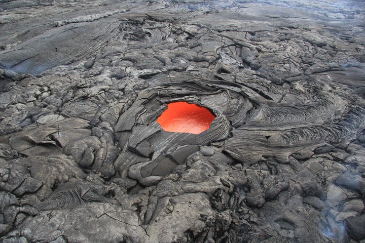 This lava skylight is an estimated 20 feet across.