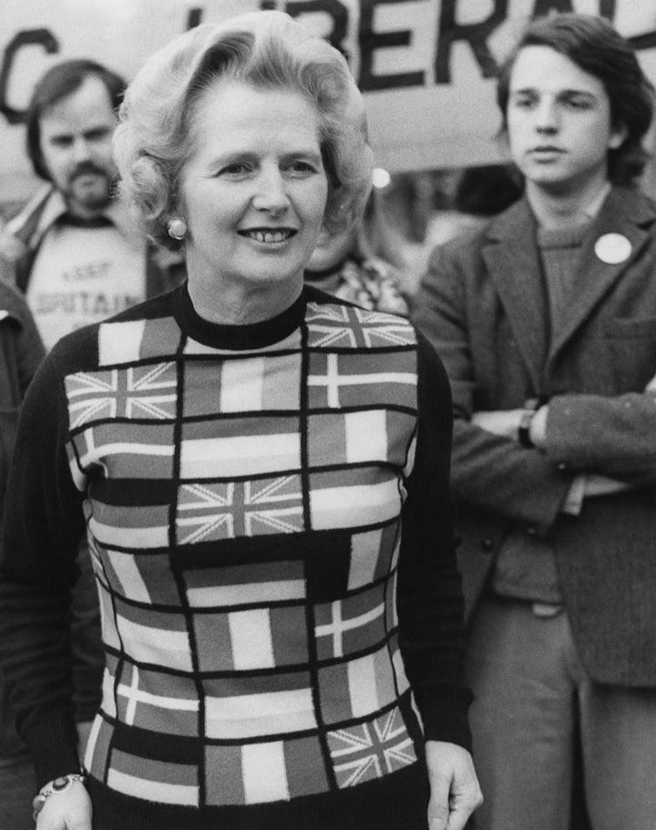 Then-Conservative opposition leader Margaret Thatcher wears a sweater with European flags as she campaigns to "Keep Britain in Europe" in London in June 1975.