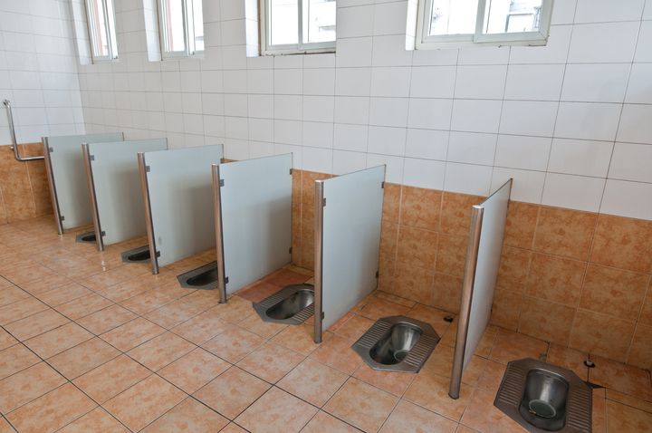 This is a row of public toilets in Beijing, China. Know how to use them? We didn't think so.