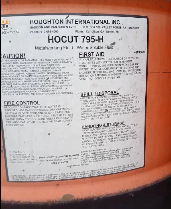 The barrel's label identifies the substance inside as Hocut 795-H. According to its manufacturer, Houghton International, that is a machining and grinding fluid.