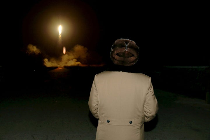 North Korean leader Kim Jong Un watches the ballistic rocket launch drill in this undated file photo released by North Korea'