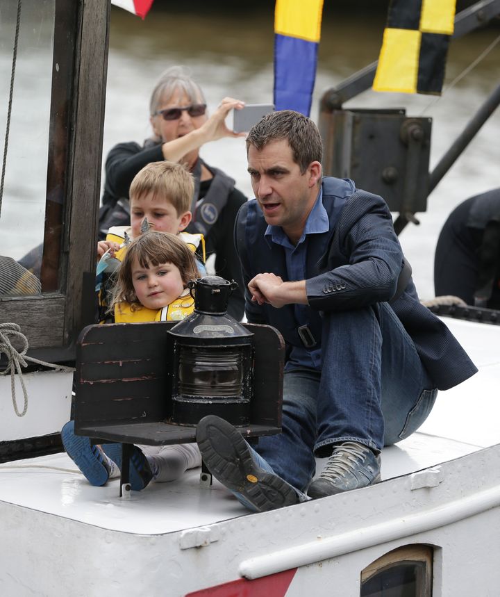 Brendon Cox, the widower of Labour MP Jo Cox, and their children Cuillin and Lejla, make their way along the River Thames.
