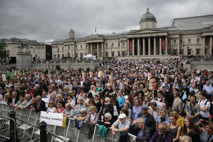 The crowd wait for the start of the rally in Trafalgar Square.