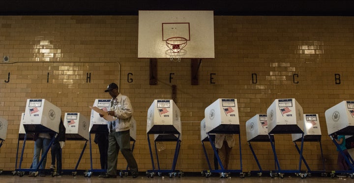 People vote at Public School 22 on April 19 in the Brooklyn borough of New York City.