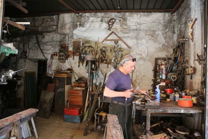 Francesco Paolo Occhione in his shop.