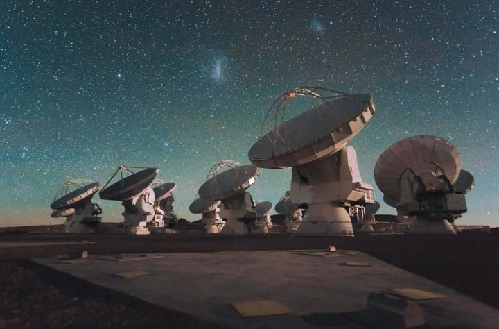 Scientists scan the night skies around Earth with special radio telescopes, like this array in Atacama, Chile.