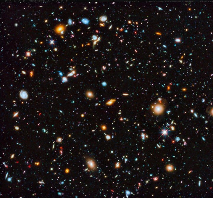 A breathtaking Hubble telescope image of a small portion of the night sky, showing about 10,000 galaxies, each of which has upwards of billions of suns with countless billions of planets.