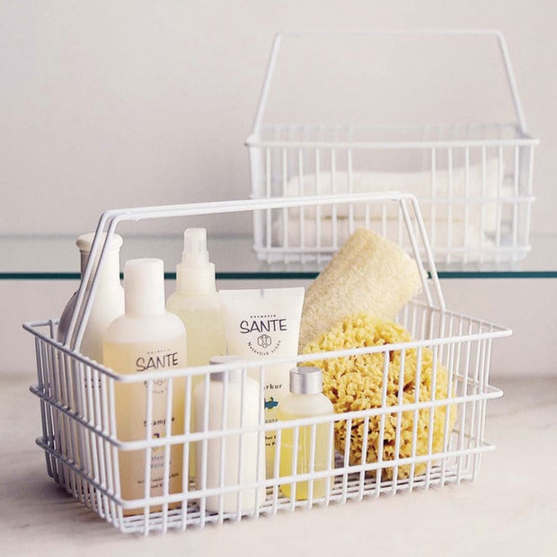 Photo Credit: <a href="http://www.dotandbo.com/collections/category-bed-and-bath-storage-and-hampers-caddies/milk-bottle