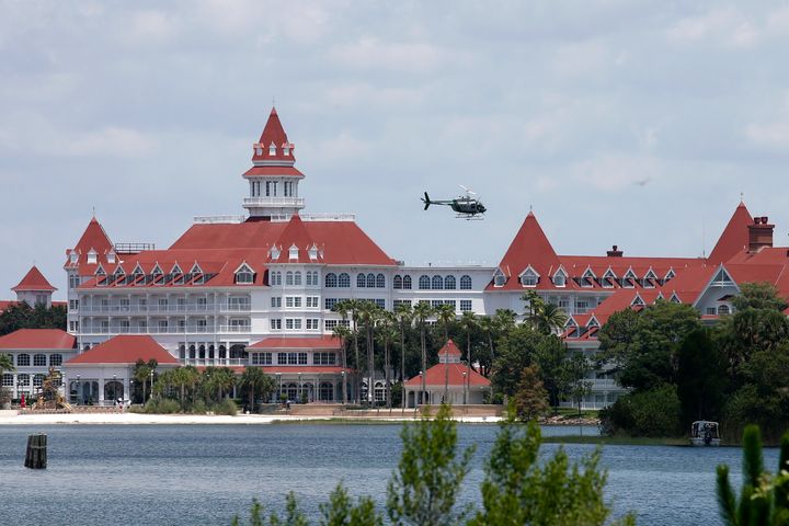 A Florida Fish and Wildlife Conservation Commission helicopter flies over the Seven Seas lagoon at Walt Disney World resort after an alligator dragged a two-year-old boy into the water in Orlando, Florida, U.S. June 15, 2016. (REUTERS/Adrees Latif)
