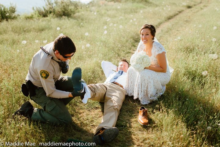 Johnny Benson got bitten by a rattlesnake while taking wedding photos with his new bride Laura.