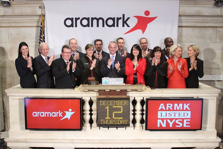 Aramark's nearly all white senior management team rings the NYSE Opening Bell to celebrate the company's IPO and first day of trading on the New York Stock Exchange.
