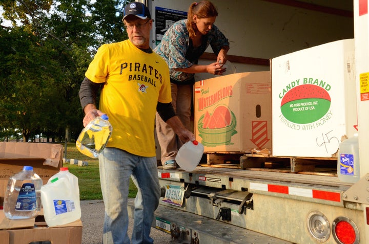 North of Pittsburgh, volunteers prepare for a weekly water drive serving residents of Connoquenessing Township who don’t believe their well water is safe to drink.