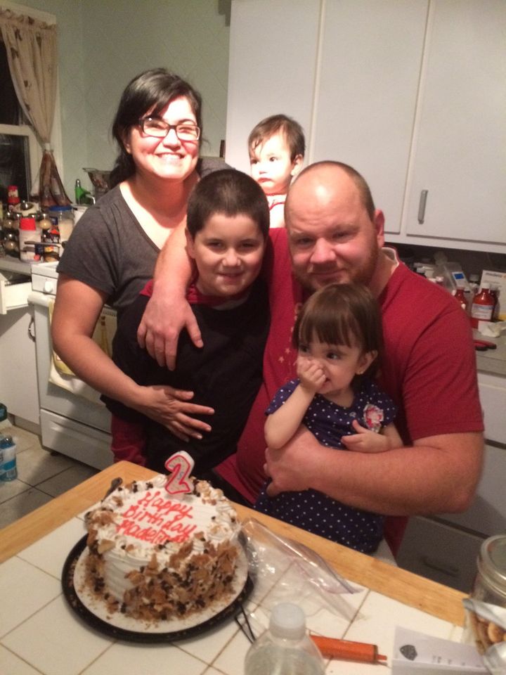 Paul Rybkin, Karen Rodas and their three children since the transplant.