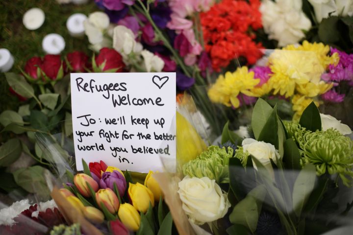 <strong>Thousands have paid tribute to Cox, including those who left flowers and messages at a memorial in Parliament Square, London</strong>