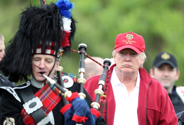 Donald Trump arrives for the opening of The Trump International Golf Links Course on July 10, 2012 in Balmedie, Scotland.