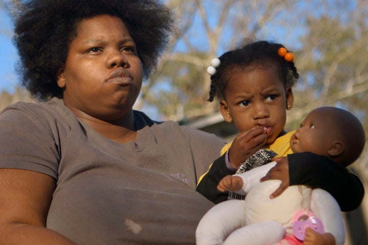 April Jackson, with one of her children. 