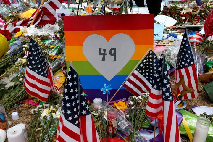 A sign with the number 49 on it is pictured as part of a makeshift memorial following the Pulse night club shootings in Orlan