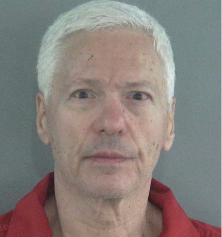 Police say Howard Sparber, 69, fired 33 rounds into the home of a woman he'd been sexually harassing for months. 