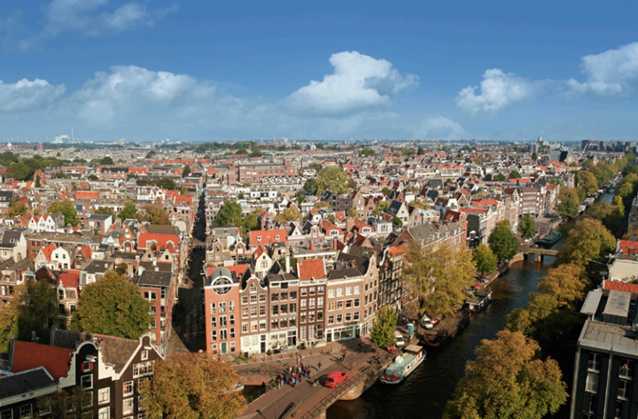 Residential and commercial neighborhoods of Amsterdam stretch as far as the eye can see along Prinsengracht, the longest of Amsterdam's four main canals.