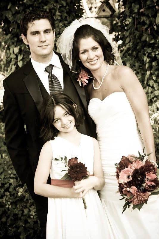 Colin, Whitney and Payton at Whitney's wedding. 