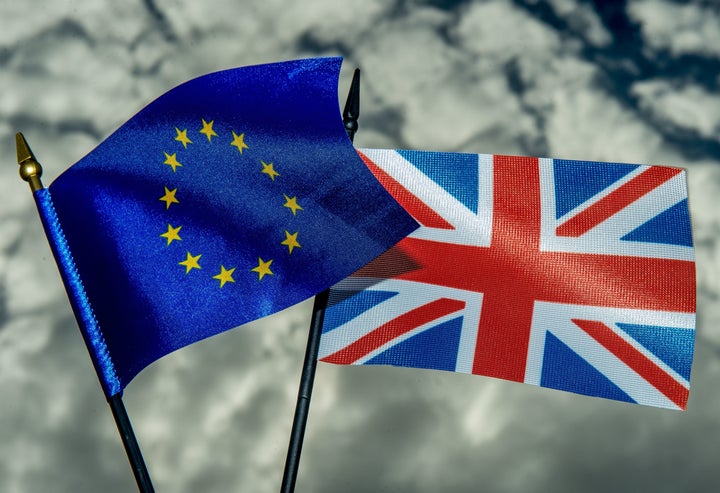 This photo illustration created on May 20, 2016 in Lille shows the flags of the European Union and the United Kingdom. On Jun