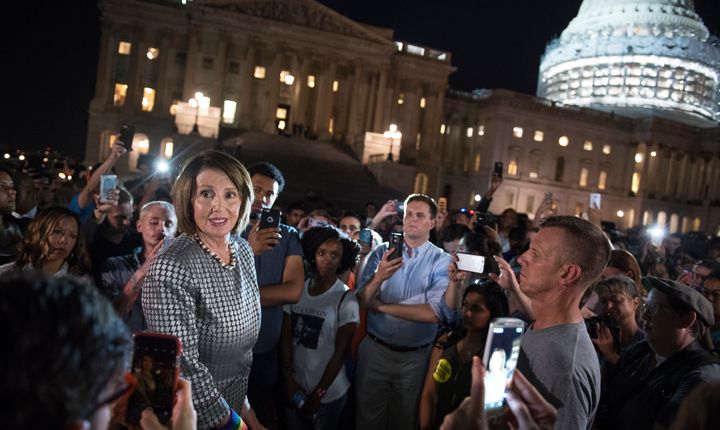 House Minority Leader Nancy Pelosi outside the Capitol during the Democrats' gun protest on Wednesday night. (Photo By Tom Williams/CQ Roll Call)