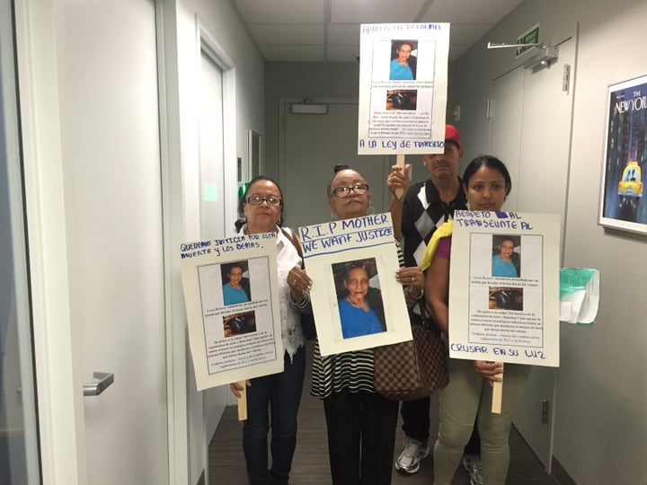 Relatives of Luisa Rosario show their support for a proposal to limit drivers' hours at the Taxi and Limousine Commission's June 23 meeting.