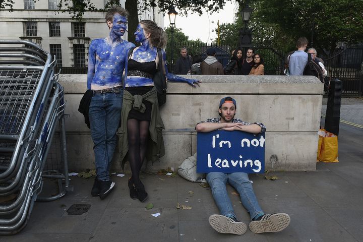 People protest against the U.K.'s referendum vote to leave the EU in London on Friday. Some 52 percent of voters chose to exit the EU on Thursday, while 48 percent voted to stay.
