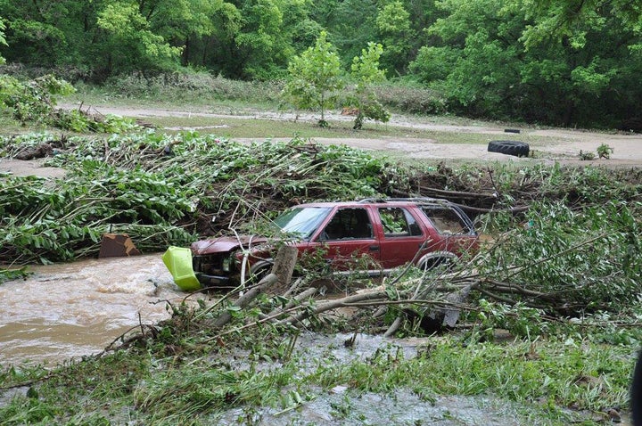 A damaged car is seen after West Virginia was pummeled by up to 10 inches of rain on Thursday.