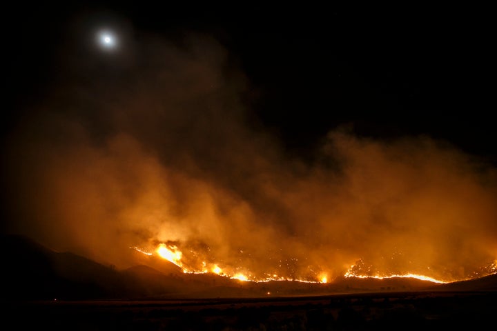 The Erskine wildfire heads down the mountains towards Kelso Valley, near Lake Isabella, Calif., on June 24, 2016.