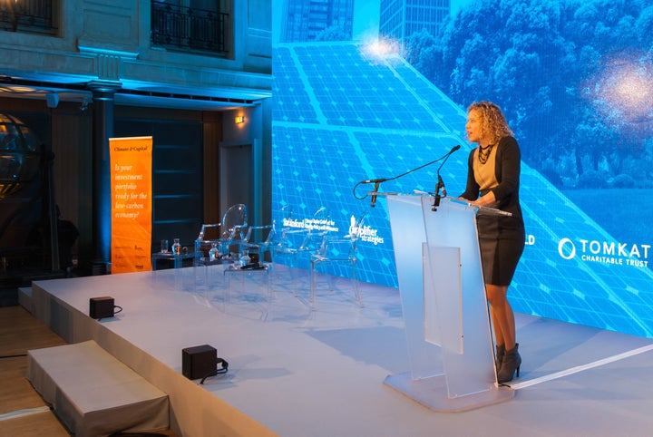 Amplifier CEO and Founder Allison Duncan addresses nearly 150 global investment and financial professionals in Paris on Dec. 9, 2015 during the Climate & Capital Conference.