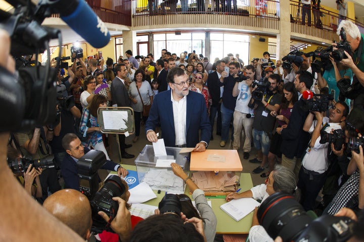 Mariano Rajoy, Spain's acting Prime Minister, casts his ballot in the Spanish general election in Madrid, Spain, on Sunday, J
