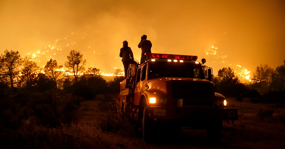 Firefighters Begin To Contain Deadly California Wildfire | HuffPost Impact