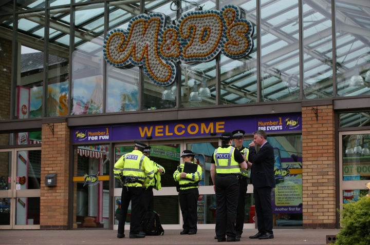 <strong>Police at the entrance to the M&D's amusement park in Motherwell, near Glasgow</strong>