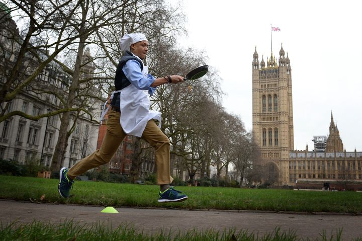 Clive Lewis taking part in the annual pancake day race for charity